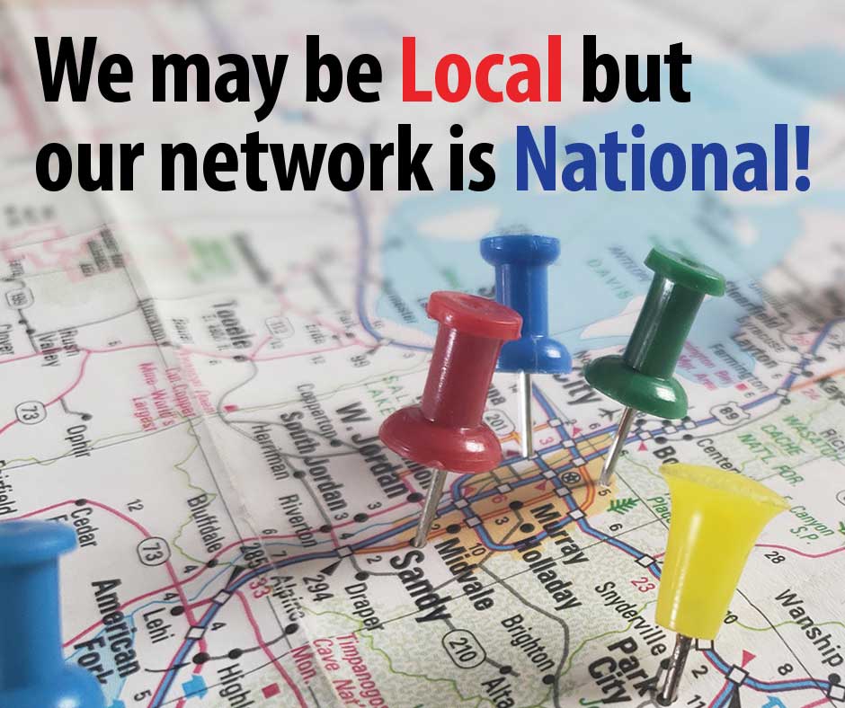 Utah road map with color stick pins.